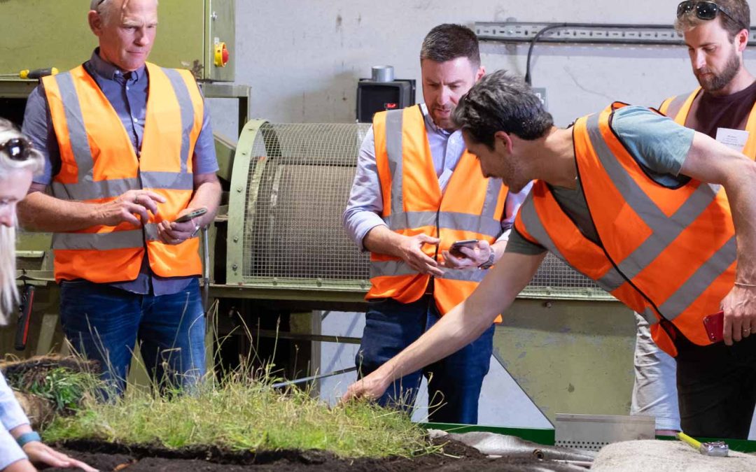 learning to handle Wildflower Green Roof Vegetation mats during a training course